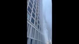 Pool water spills from high-rise condo in Bangkok during earthquake