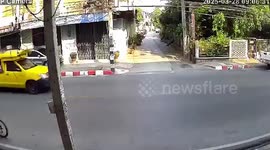 Communication cables explode above street in Thailand