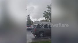 Twister's mile-long path of damage in Californian city