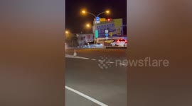 Escaped goose seen carelessly waddling along motorway in Taiwan