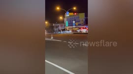 Escaped goose seen carelessly waddling along motorway in Taiwan
