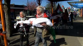 Protestors hold Silent-March and Palestine Peace-Vigil in Welsh Town.