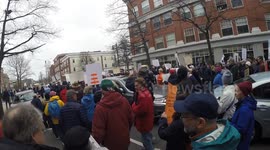 Hands Off Protestors Marching Down Washington Street in Salem, Massachusetts