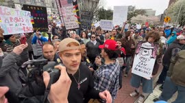 Counter-protesters attempt to disrupt the anti-Trump ‘HandsOff!’ protest at the Pennsylvania State Capitol