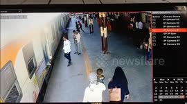 Schoolgirl, 14, falls under moving train before hero station officer saves her life