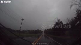 Dashcam Captures Storm Chaser Crossing Flooded Roads in Arkansas