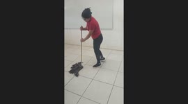 Person slips and falls while playing with mop in Puerto Vallarta