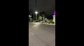 Old car makes sharp tilted turn in Mendoza, Argentina