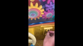 Guy falls off kiddie ride in Malang, Indonesia