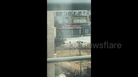 Tanks drive through the streets of Jenin