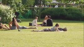 People enjoying the heatwave in London
