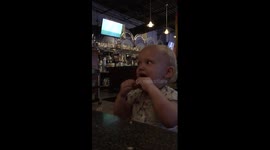 Cutest toddler eats lime and laughs