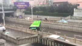 Bus driver forced to make U-turn by torrential rain