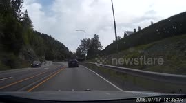 biker rides on red