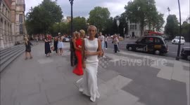 Tiffany Watson and Claire Chin Sue attend Revlon's Choose Love Masquerade Ball in London