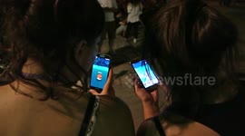 POKEMON GO frenzy as hundreds of players gathered in parks during the night to play together