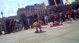 Tianna the Traveller preforms escape at the International busking day in Trafalgar Square, London,, UK. Photo by See Li