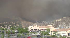 sky crane Helicopter firefighting water drops at