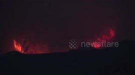 Huge 200-foot-high+ flames on mountain (300mm zoom) at