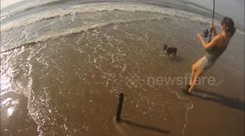 Girl Catches 2 Sharks