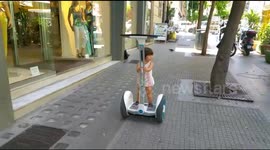 Talented toddler rides segway on holiday