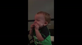 Baby tries a lemon