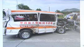 Ambulance running red light is smashed by trailer