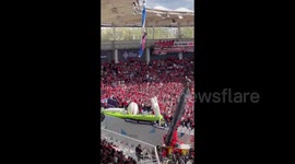 France: Rugby Game Delayed As Parachutist Hangs From Roof
