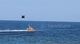 RNLI Llandudno practicing with helicopter