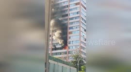Chile: Santiago Firefighters Respond to Apartment Blaze