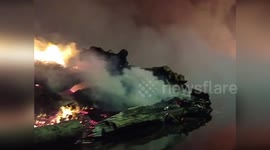 Italy: Firefighters Continue Battling Blaze at Wooden Panel Factory