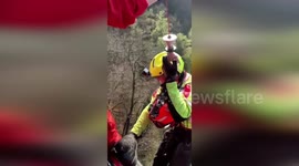 Helicopter rescue team saves hikers in Italy
