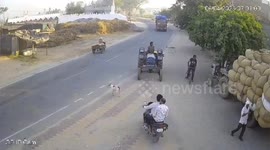 Distracted motorcycle rider crashes straight into oncoming truck