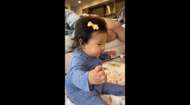 Baby girl copies family dog's bark in adorable fashion