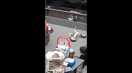 Sister tries to lift baby in chair but accidentally tosses him onto floor