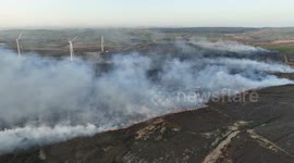 Drone Footage - Gorse Fire Burning Near House & Wind Turbines This Evening - clip 5