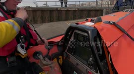 RNLI crew saves two tourists stranded by rising tide in England