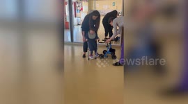 Brave tot with rare syndrome walks for the first time