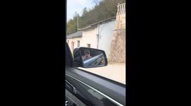 Car being towed away while driver sleeps in Zhejiang, China