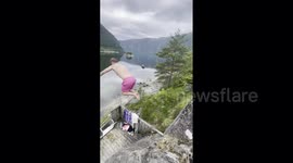 Norwegian Freerunner's Insane Cliff Dive and Slide - The Ultimate Summer Thrill