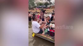 Politician sparks outrage after partying with coyote dancers on restaurant raft