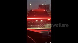 Too cute! Electric vehicle taillight displays animated leaping kitten