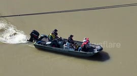 US: Rescue Boat Navigates Flooded Streets in Dyersburg, TN