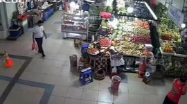 Child falls while avoiding debris in store, CCTV footage captures incident
