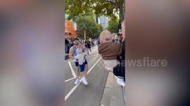 Dad crosses finish line with NICU survivor son in children's hospital fundraiser