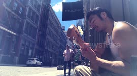 Store Manager Encourages Street Musician