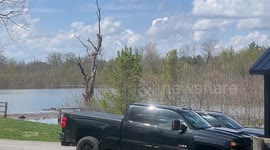 Flood waters slow to recede in areas far away from major tributaries