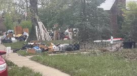 Residents are discarding flood ravaged household goods on Paul Sawyer drive , Frankfort, KY