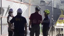 Earthquake search teams race against approaching storms as more victims are found under rubble in Bangkok