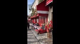 Tourists watching painters at Place du Tertre Paris France